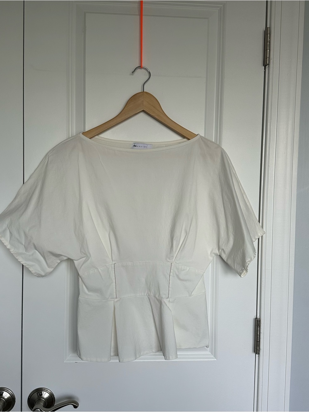 Women’s White Peplum Short-Sleeve Top